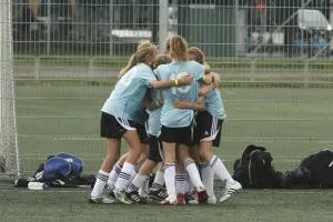 Hugs all around after a win in the final