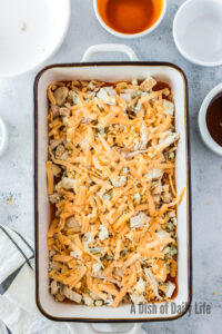 sharp cheddar cheese spread over chicken blue cheese mixture.