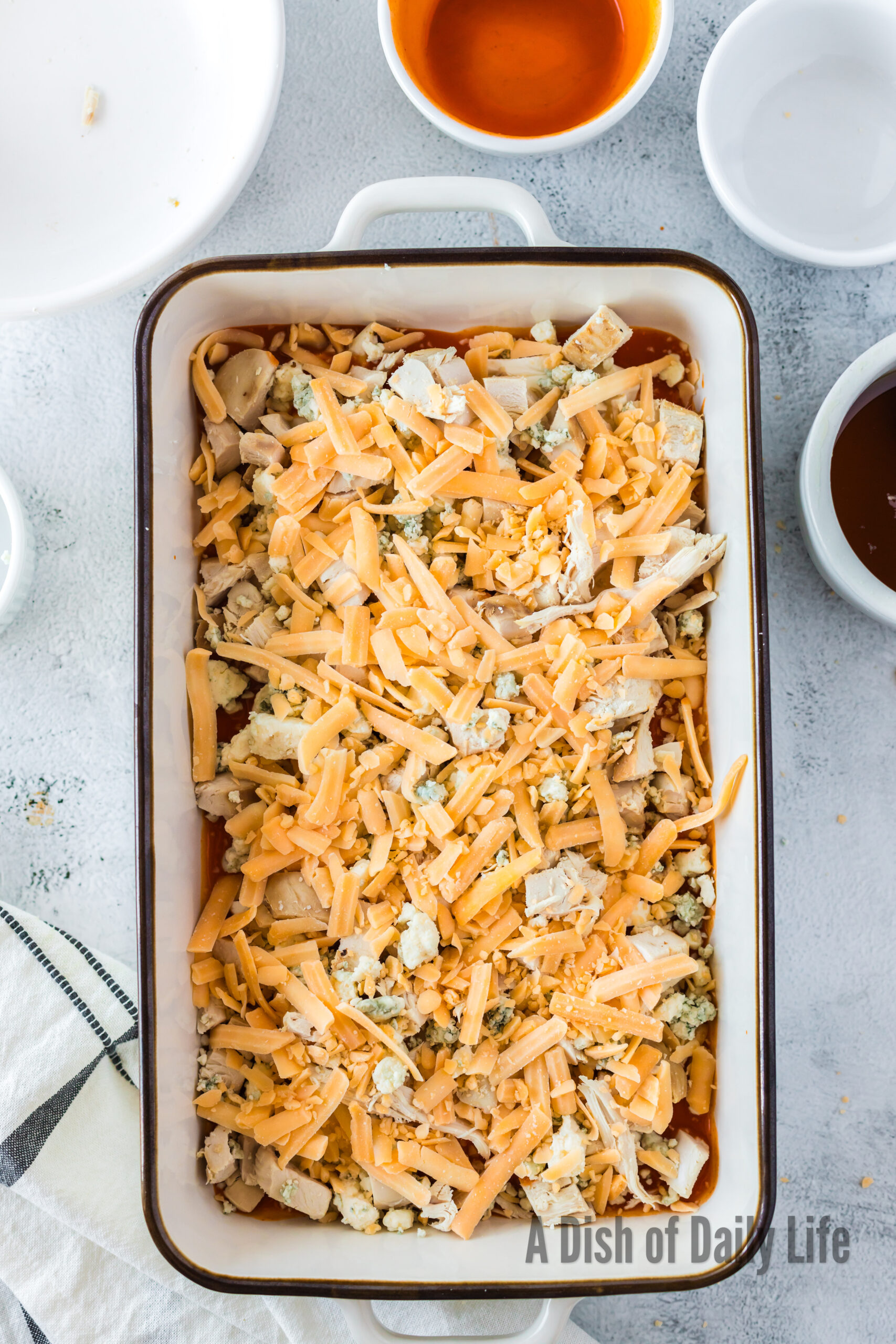 sharp cheddar cheese spread over chicken blue cheese mixture.