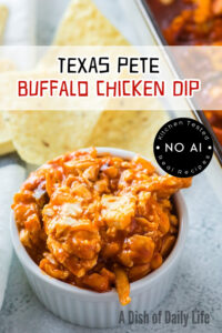 A small bowl full of dip ready to eat.