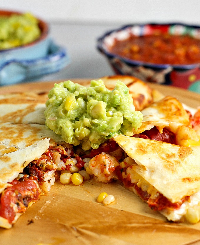 Roasted Tomato, Corn, and Shrimp Quesadillas are a great appetizer for Mexican night, any party or gathering, and of course Cinco de Mayo. Guaranteed rave reviews!