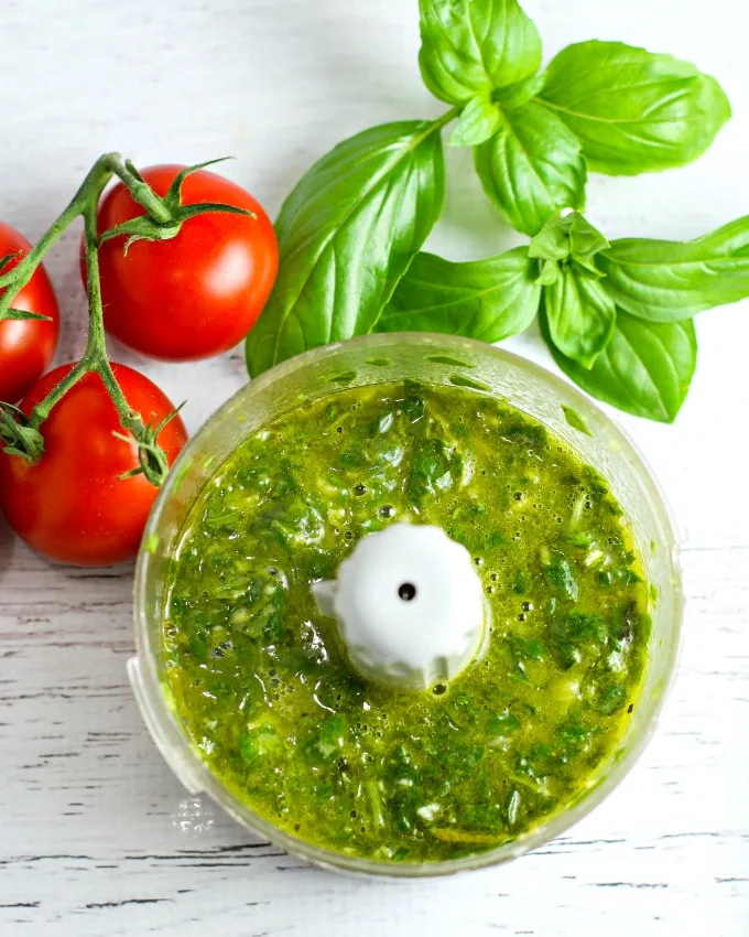 Colorful, healthy, and packed with flavor, this easy Tomato, Basil and Feta Summer Salad is the perfect side dish for any summer dinner, and even makes for a wonderful light lunch as well. Go ahead and customize it by adding in cucumber or even summer corn...the basil dressing goes well with everything!