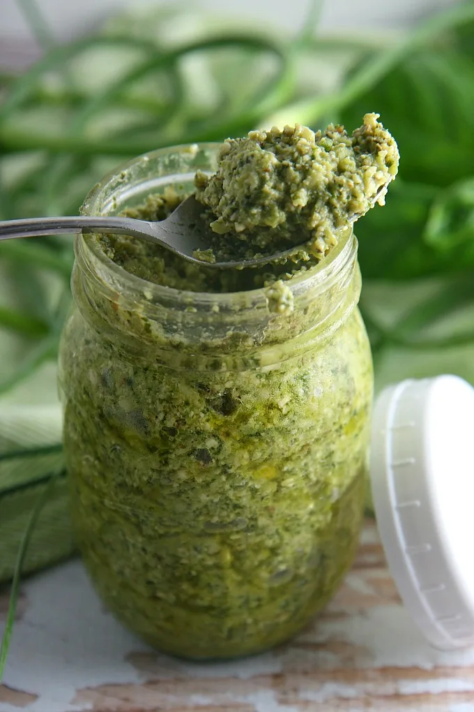 Garlic Scapes Pesto...serve this vegetarian farmer's market favorite over pasta or chicken, spread on sandwiches or paninis, or even as an appetizer dip for bread! It freezes well too!