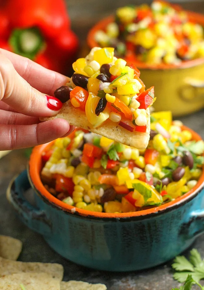 Corn Salsa with Black Beans is the perfect party appetizer for summer...serve it with chips and watch how fast it disappears! Easy to make and healthy too! 