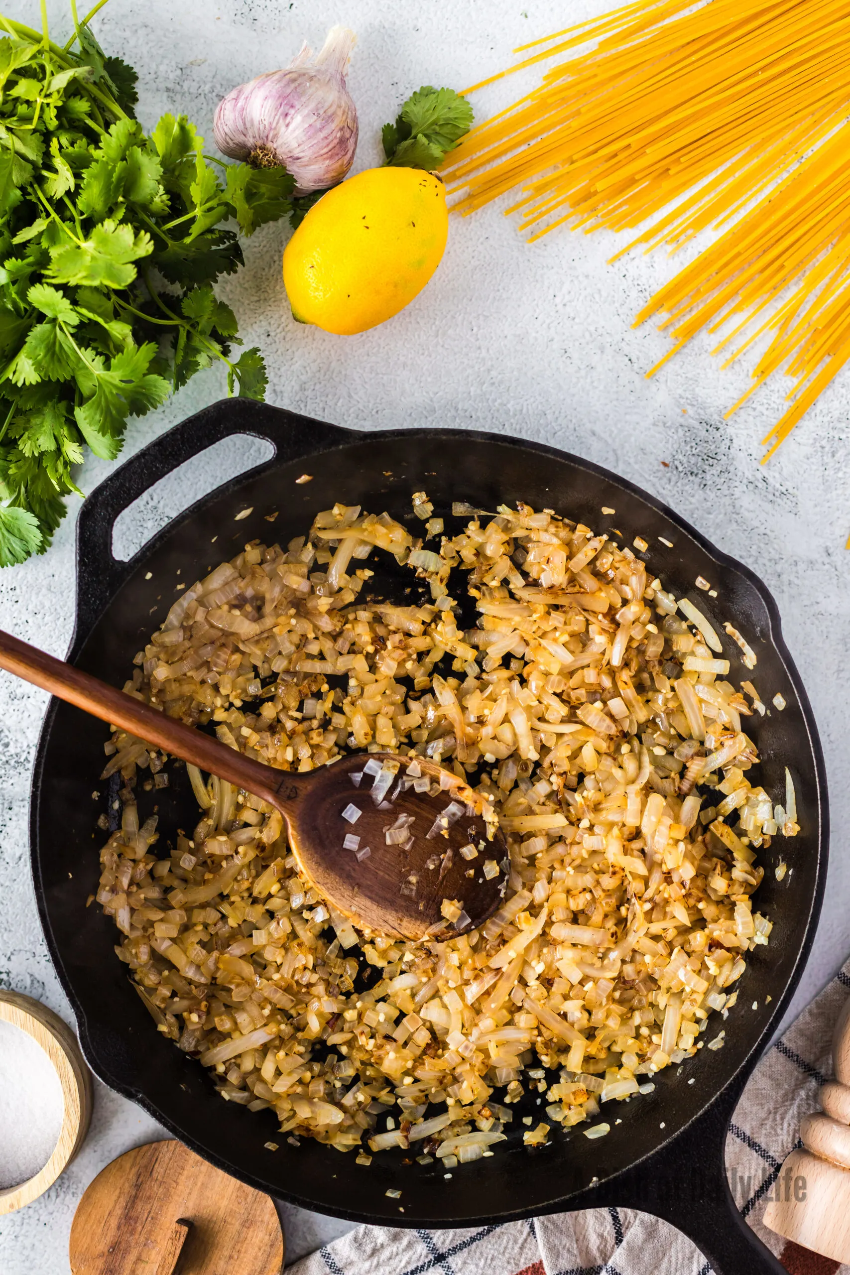 Onions and oil sautéed with garlic added