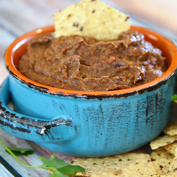 This Southwestern bean dip is great as a stand-alone appetizer, but it also can be used as a base for a layer dip, in burritos and quesadillas or as refried beans!