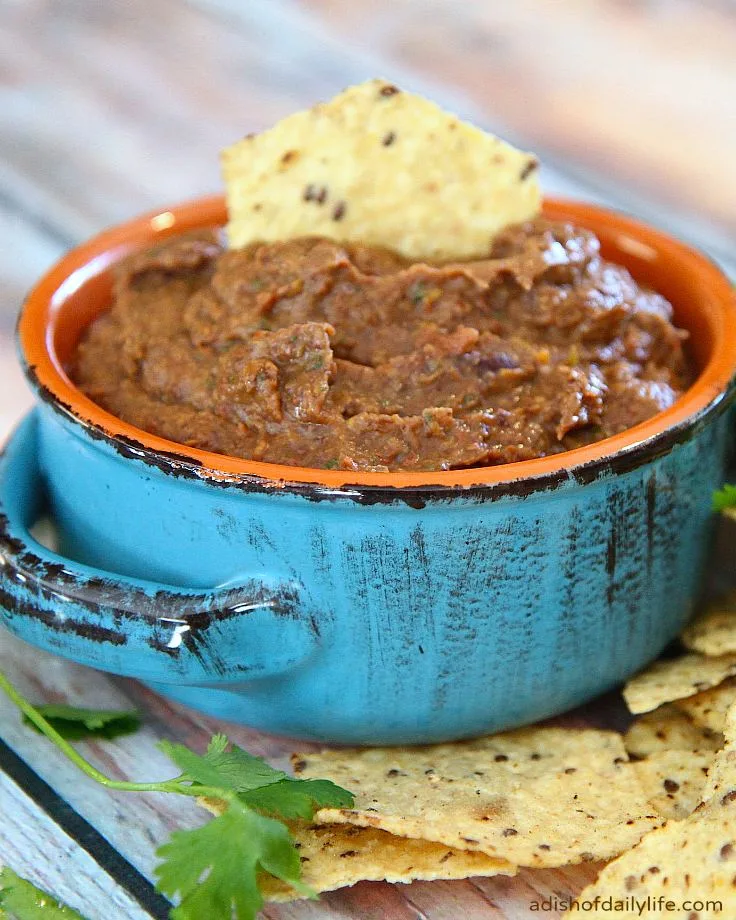 This Southwestern bean dip is great as a stand-alone appetizer, but it also can be used as a base for a layer dip, in burritos and quesadillas or as refried beans!