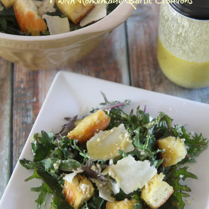 Trade traditional romaine lettuce for vitamin rich baby kale in this delicious Baby Kale Caesar Salad with Homemade Garlic Croutons