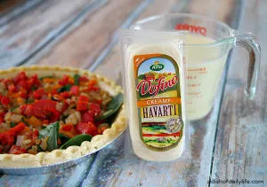 Making a spinach and roasted pepper quiche with Arla Dofino Creamy Havarti