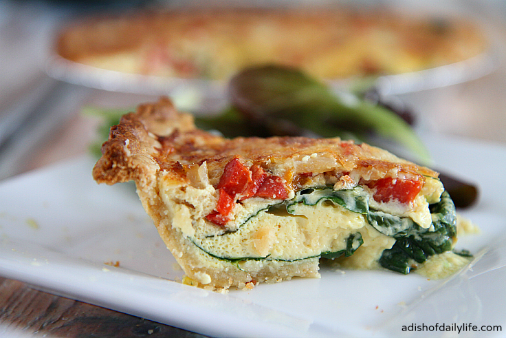 This spinach and roasted pepper quiche with Havarti cheese is a delicious holiday breakfast idea!