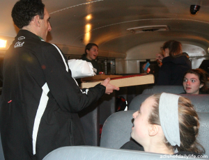 he IN-VINCE-IBLE PIZZA and SANDWICH being handed off to hungry track athletes after a meet