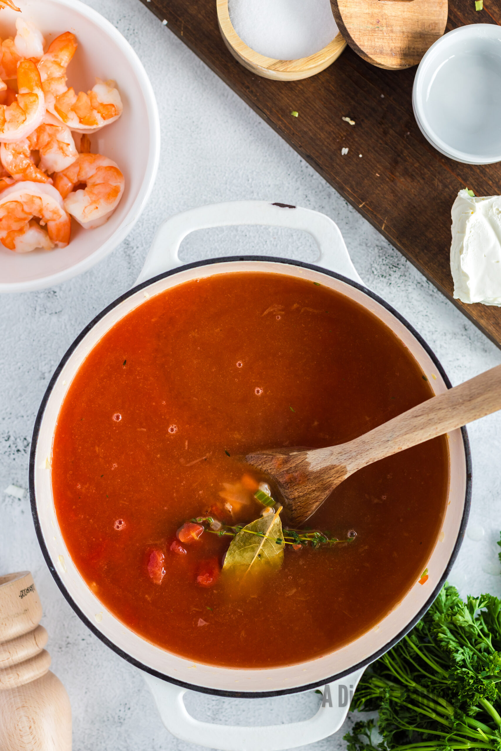 tomatoes and broth added to bisque