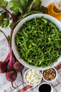 All ingredients for Beet and Goat Cheese Salad laid out on counter