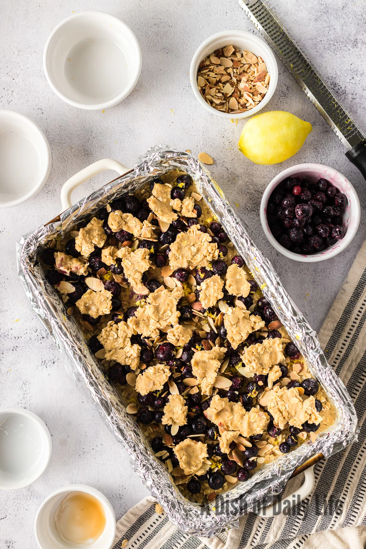 crust bits spread over the top of blueberry mixture.