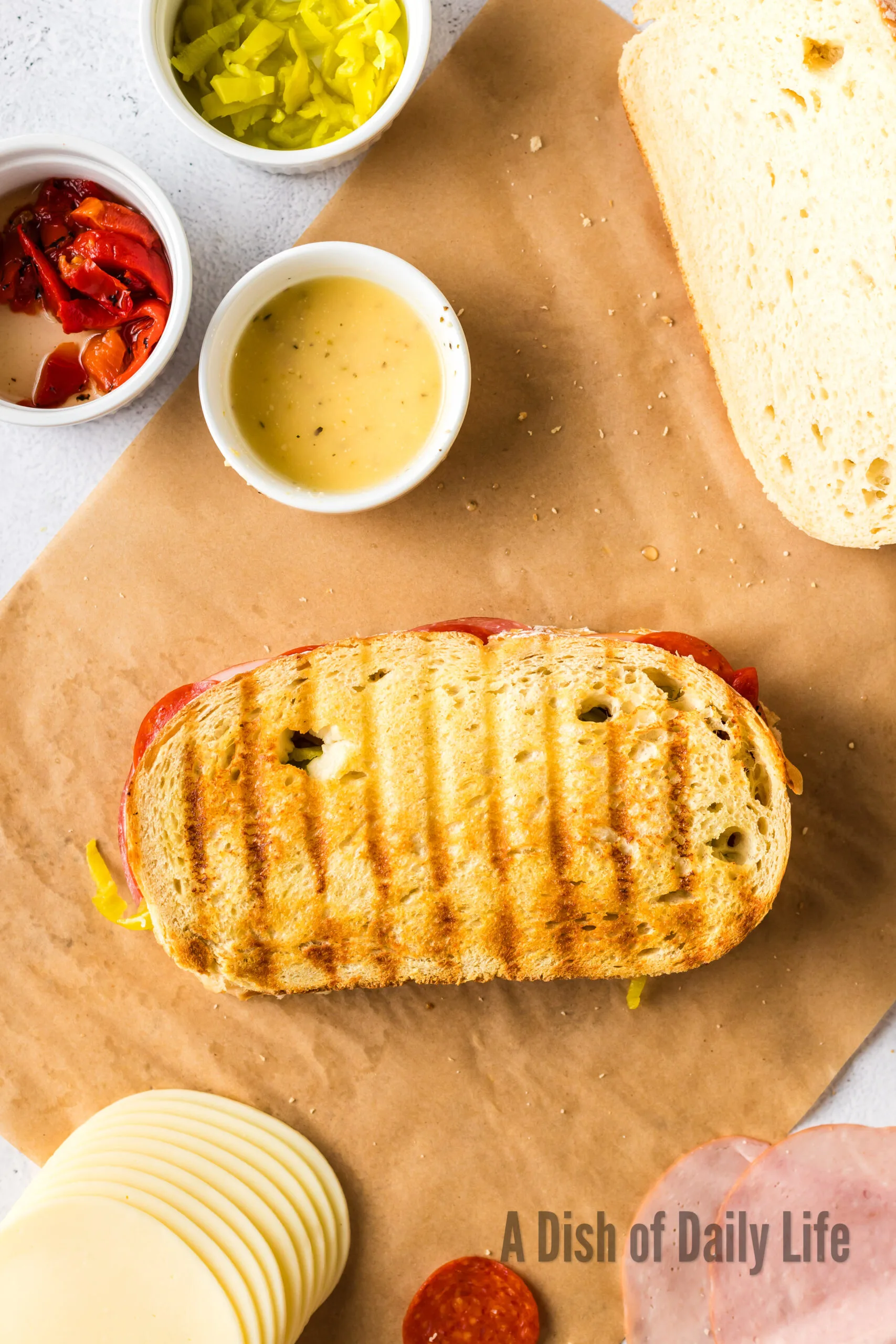 Grilled panini on cutting board