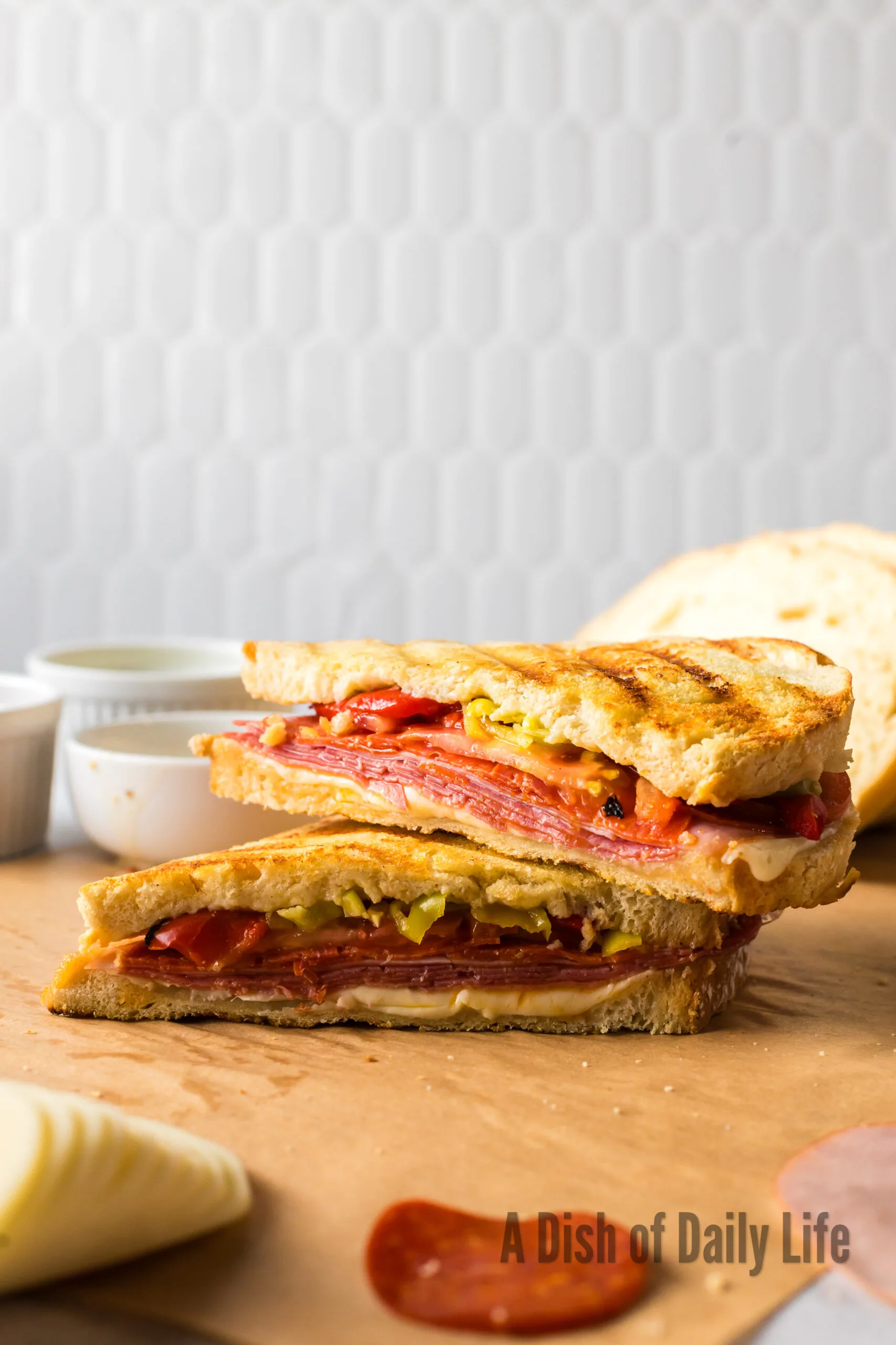 pepperoni panini cut in half to show filling