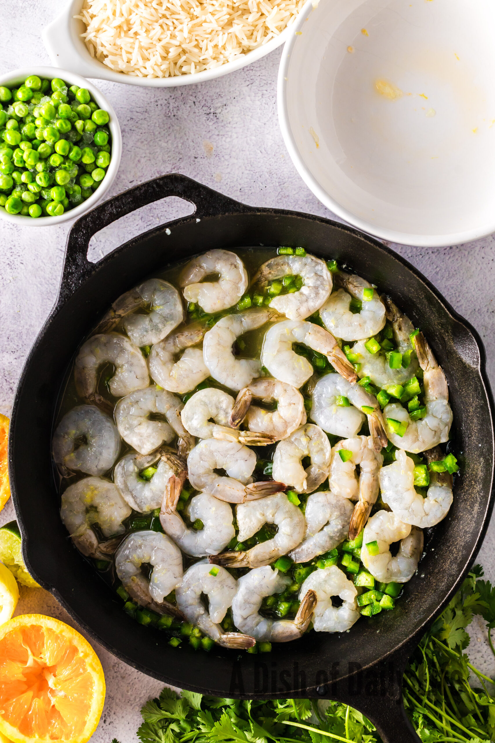 marinated shrimp added to a skillet