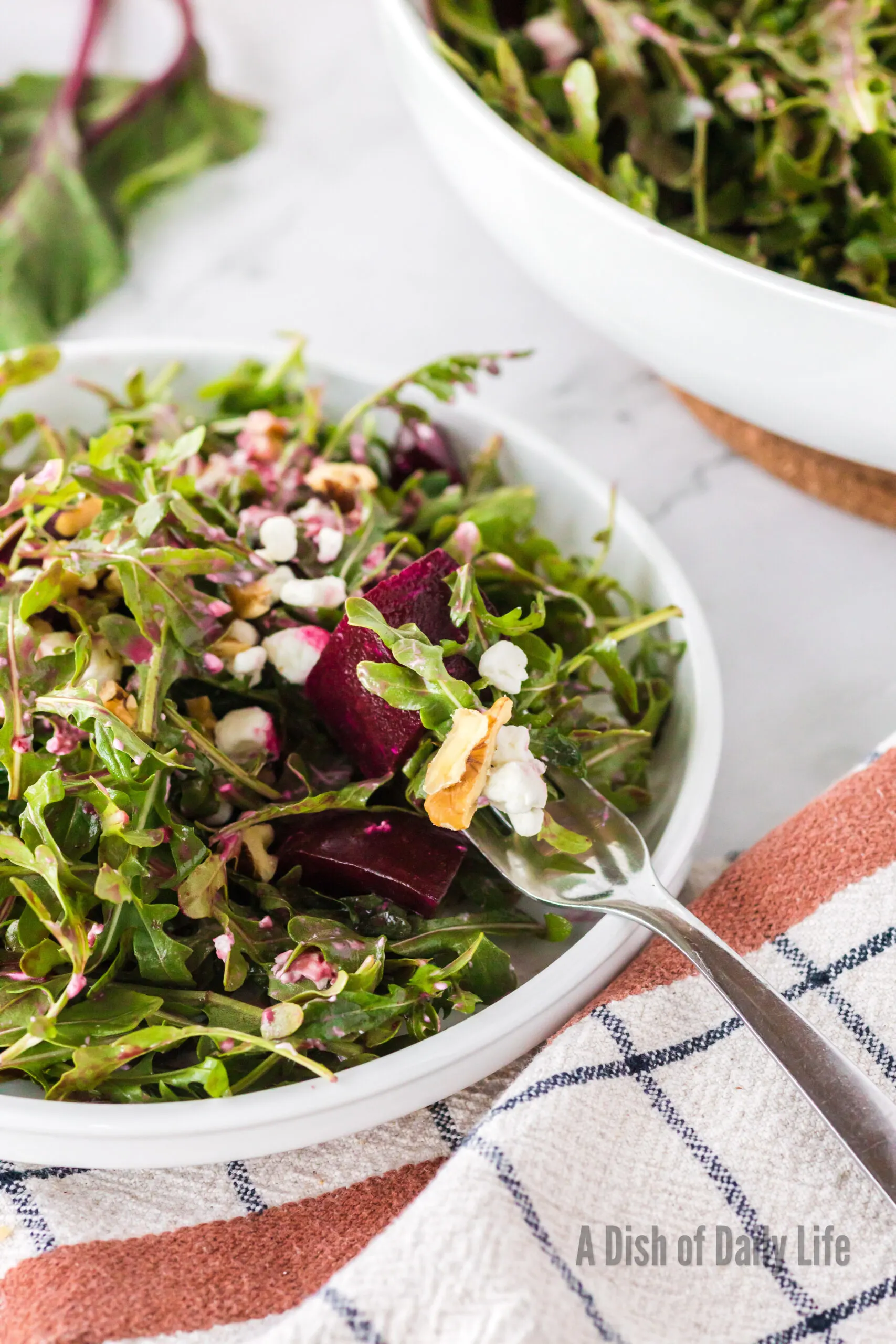 side view of tossed beet salad, ready to serve!