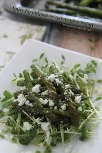 Delicious spring salad...Baby Pea Shoot and Asparagus Salad, topped with feta and a lemon vinaigrette
