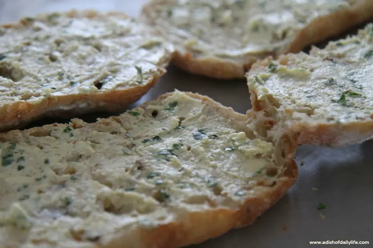 Roasted Garlic Butter spread on bread