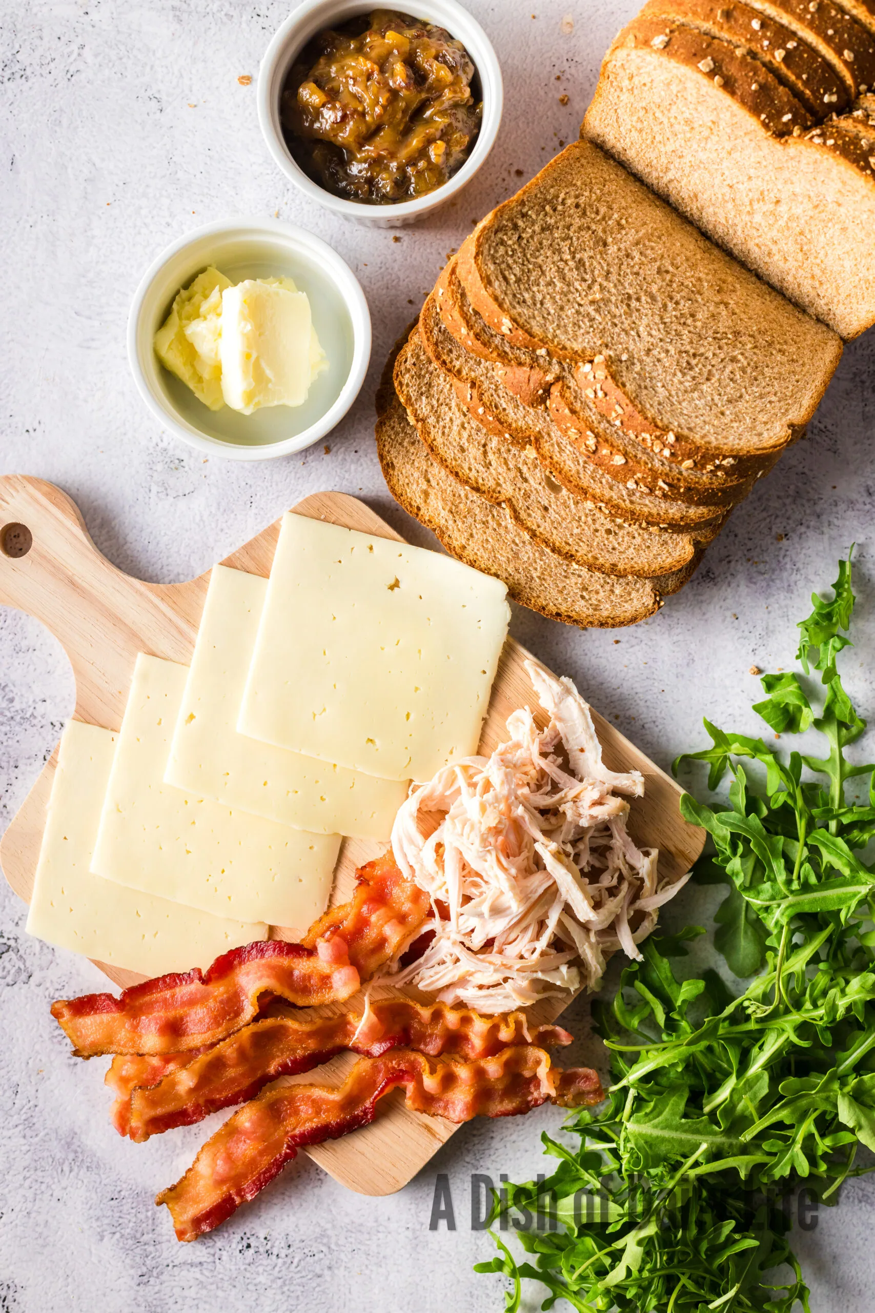 All ingredients for leftover turkey sandwich laid out on counter.