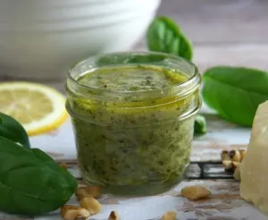 Freeze your extra basil pesto with lemon in mason jars with plastic lids. This mini mason jar holds the perfect serving amount for sandwiches, chicken or just an extra dollop of flavor!