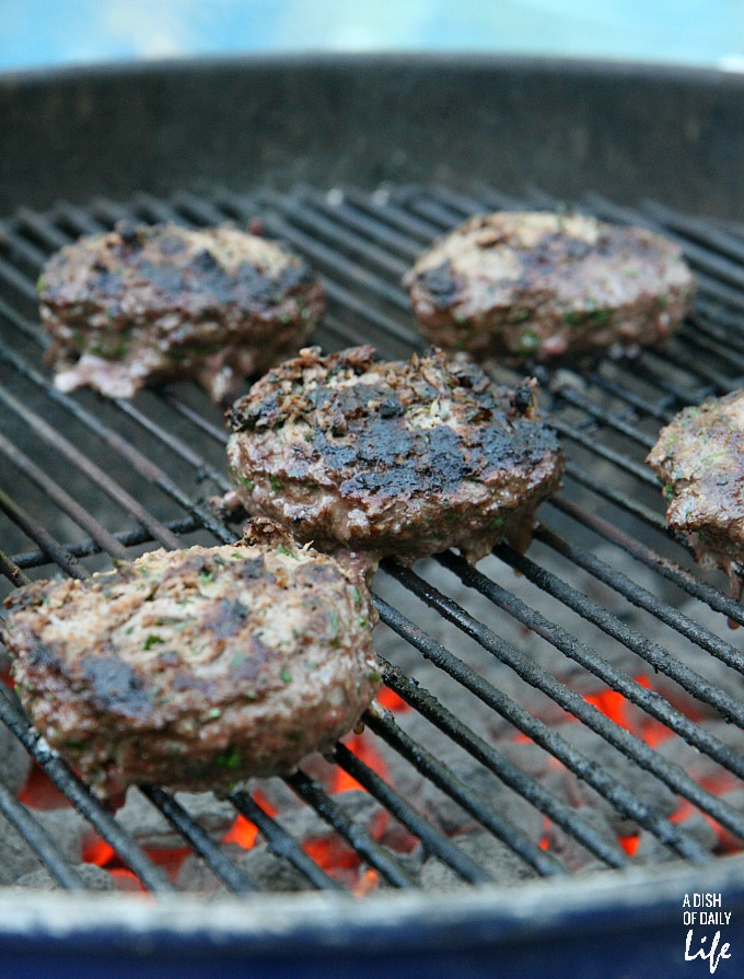 Lebanese Kafta Burgers with lamb and beef cooking on the grill