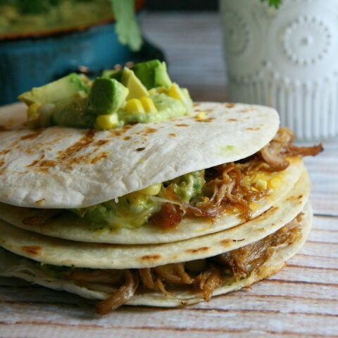 Pulled Pork Quesadillas topped with Tomatillo Guacamole