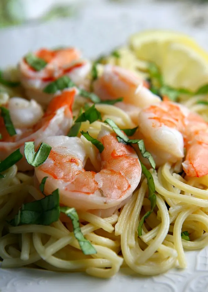 This One Pot Creamy Lemon Shrimp Pasta is an easy dinner recipe for busy families, ready in 15 minutes or less! A light flavorful pasta with a citrus-y flavor, it's also the perfect dinner when it's hot outside and you don't want to heat up the kitchen!