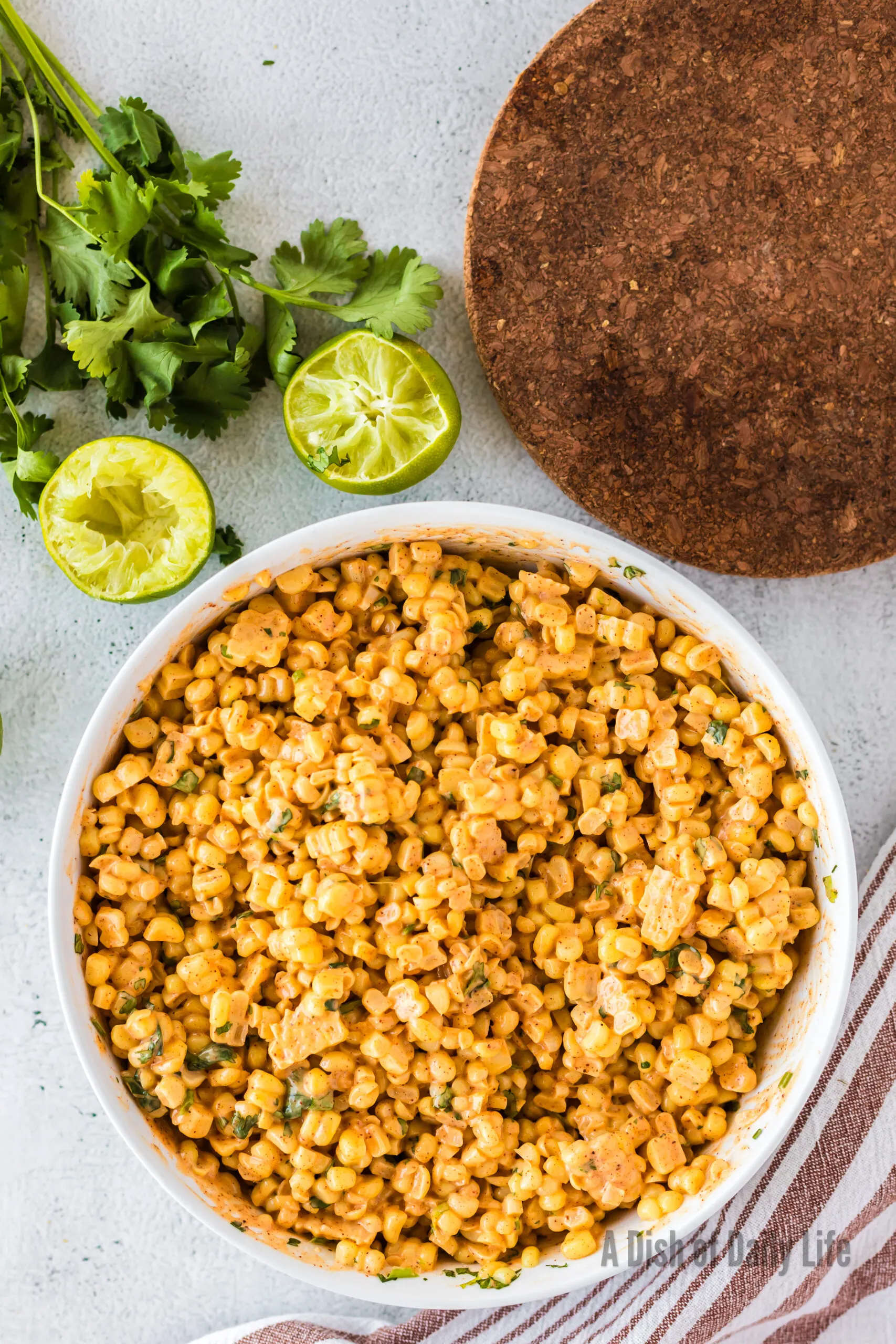 Corn salad mixed in bowl and ready to serve.