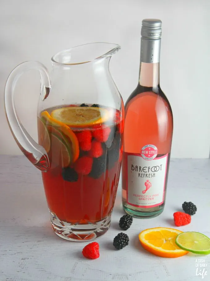 This Pomegranate Berry Sangria Spritzer recipe is a delicious refreshing and "lightened up" version of a traditional sangria...perfect for casual entertaining!