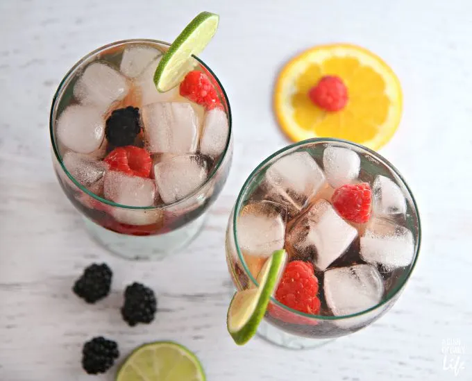 This Pomegranate Berry Sangria Spritzer recipe is a delicious refreshing and "lightened up" version of a traditional sangria...perfect for casual entertaining!