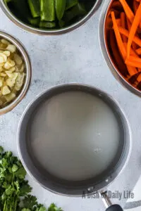 water, sugar and vinegar in a pot, uncooked