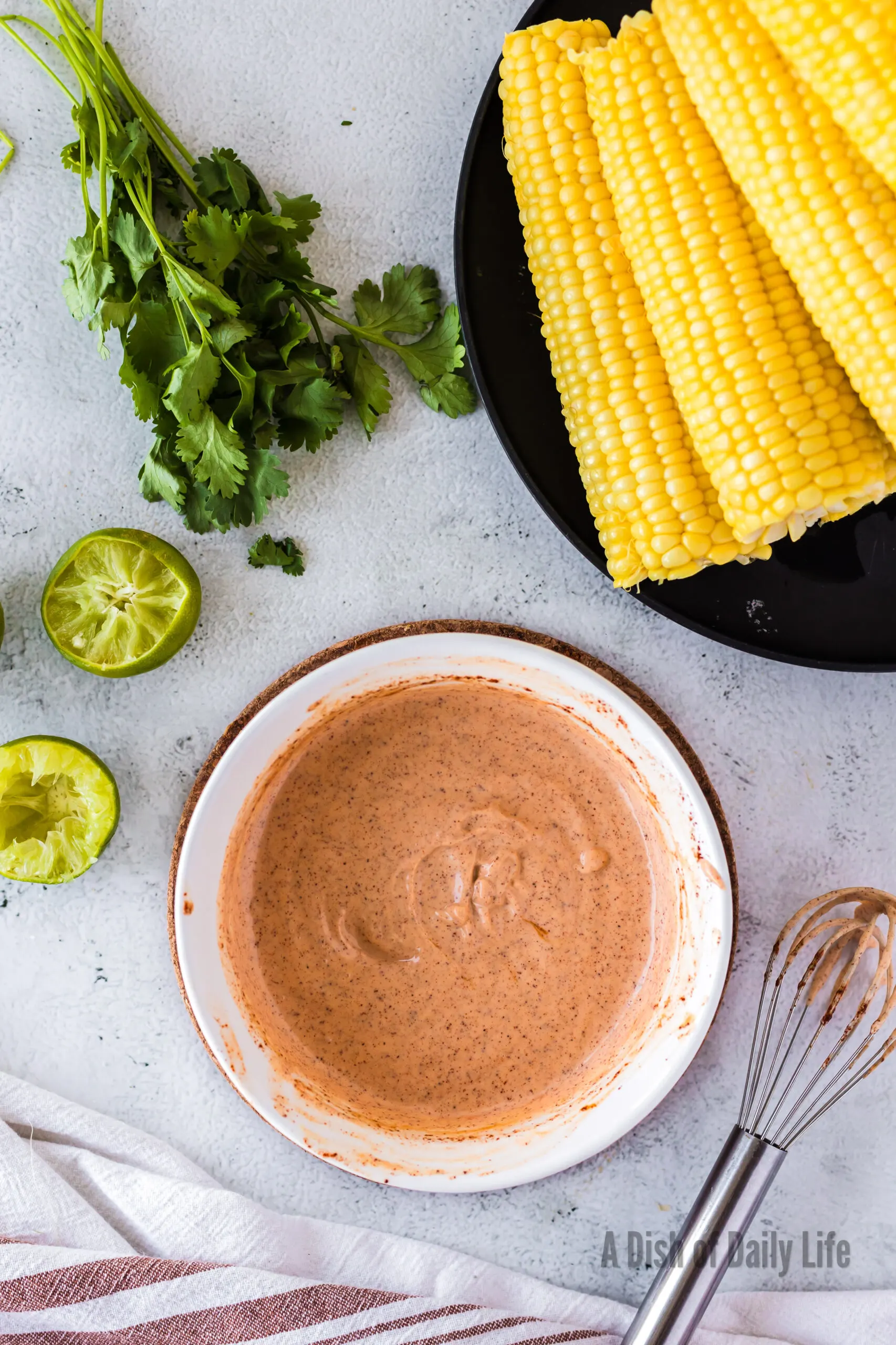 Dressing mixed in a small bowl.