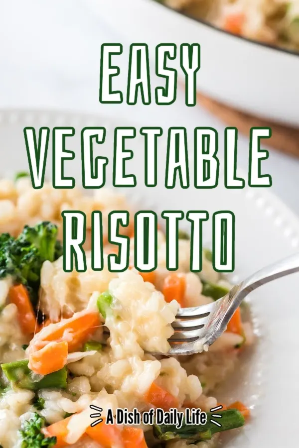 Main image for Easy Vegetable Risotto. Bowl of risotto with a fork picking some up.