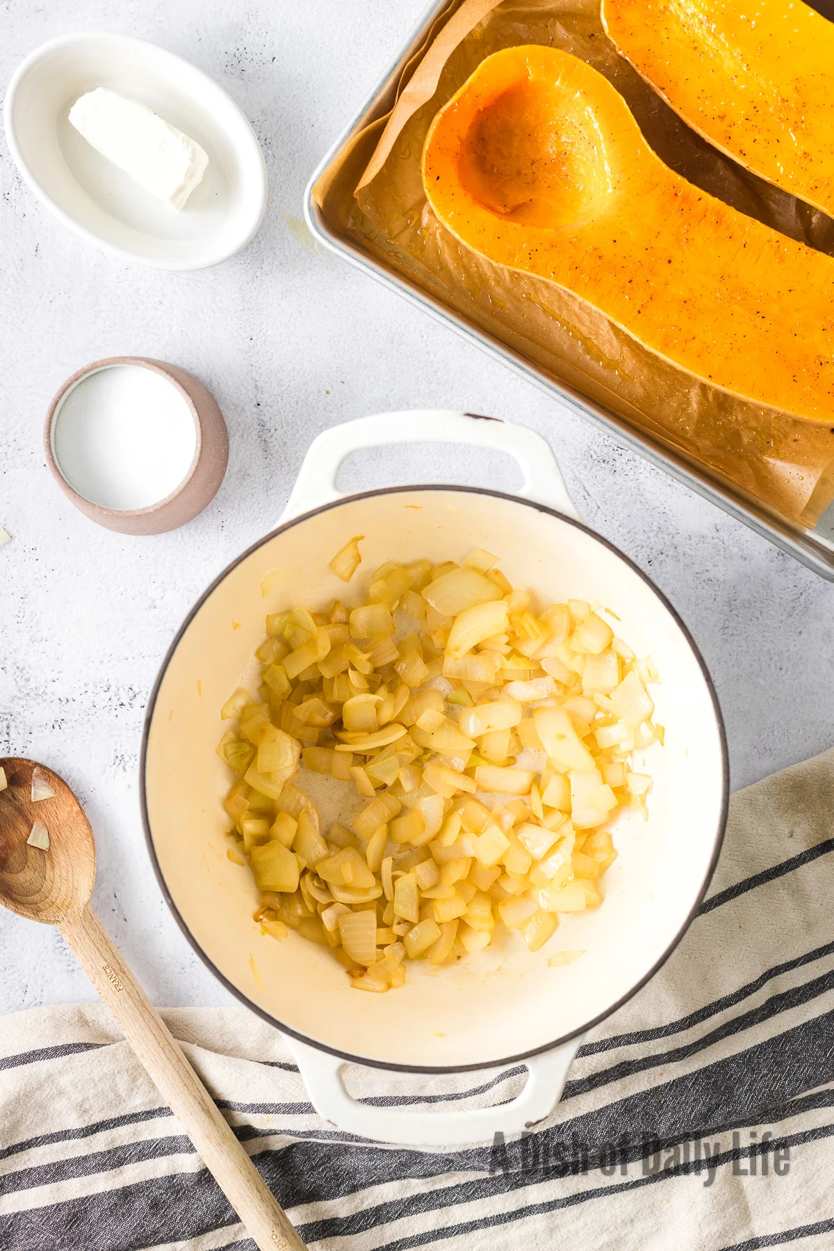 Olive oil and onions in a dutch oven pot.