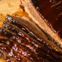 top view of sliced brisket on cutting board