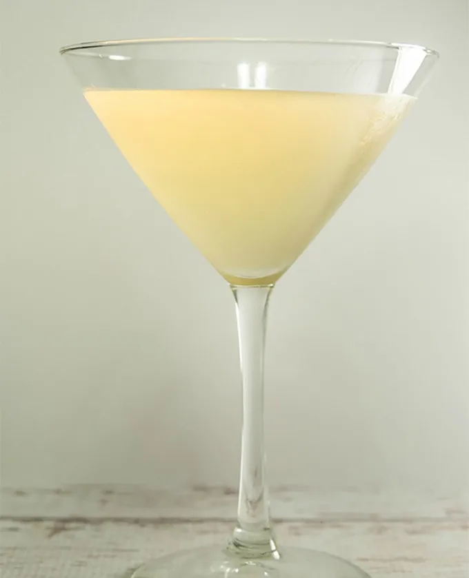 A delightful holiday cocktail, the Cinnamon Apple Cider Martini features a delicious cinnamon apple cider simple syrup that is so versatile that you're going to want to use it with food, desserts, and tea as well!