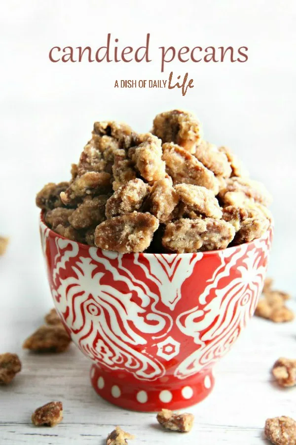 Candied pecans…great holiday gift, easy recipe for your Christmas cookie exchange, and a lovely addition to your holiday dessert table. Use them in salads and as a topping for desserts too. This is a MUST MAKE recipe this holiday season! #holidayfoodgifts #homemadegifts #Christmas #candiednuts #dessert #snack
