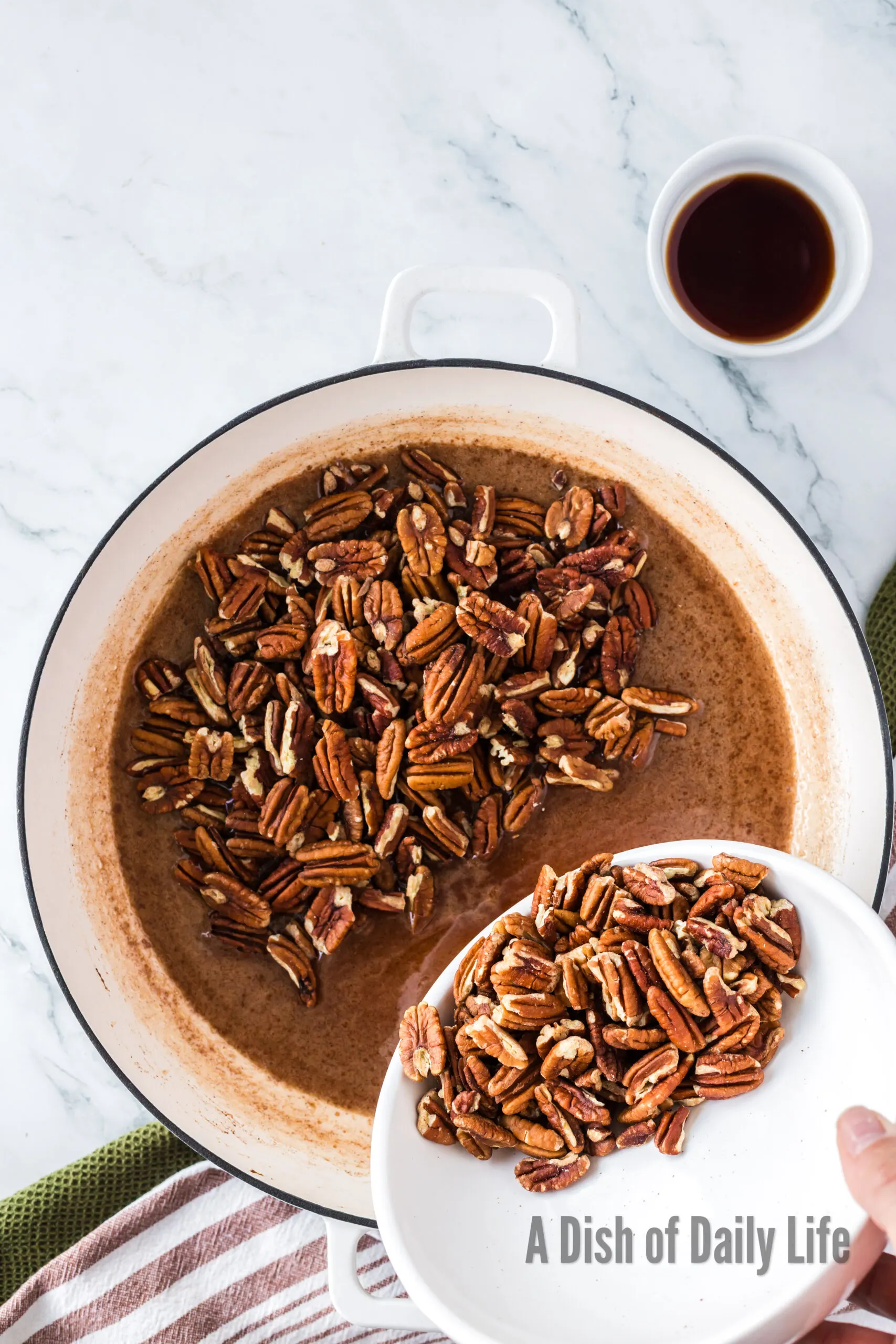 pecans added to cinnamon mixture