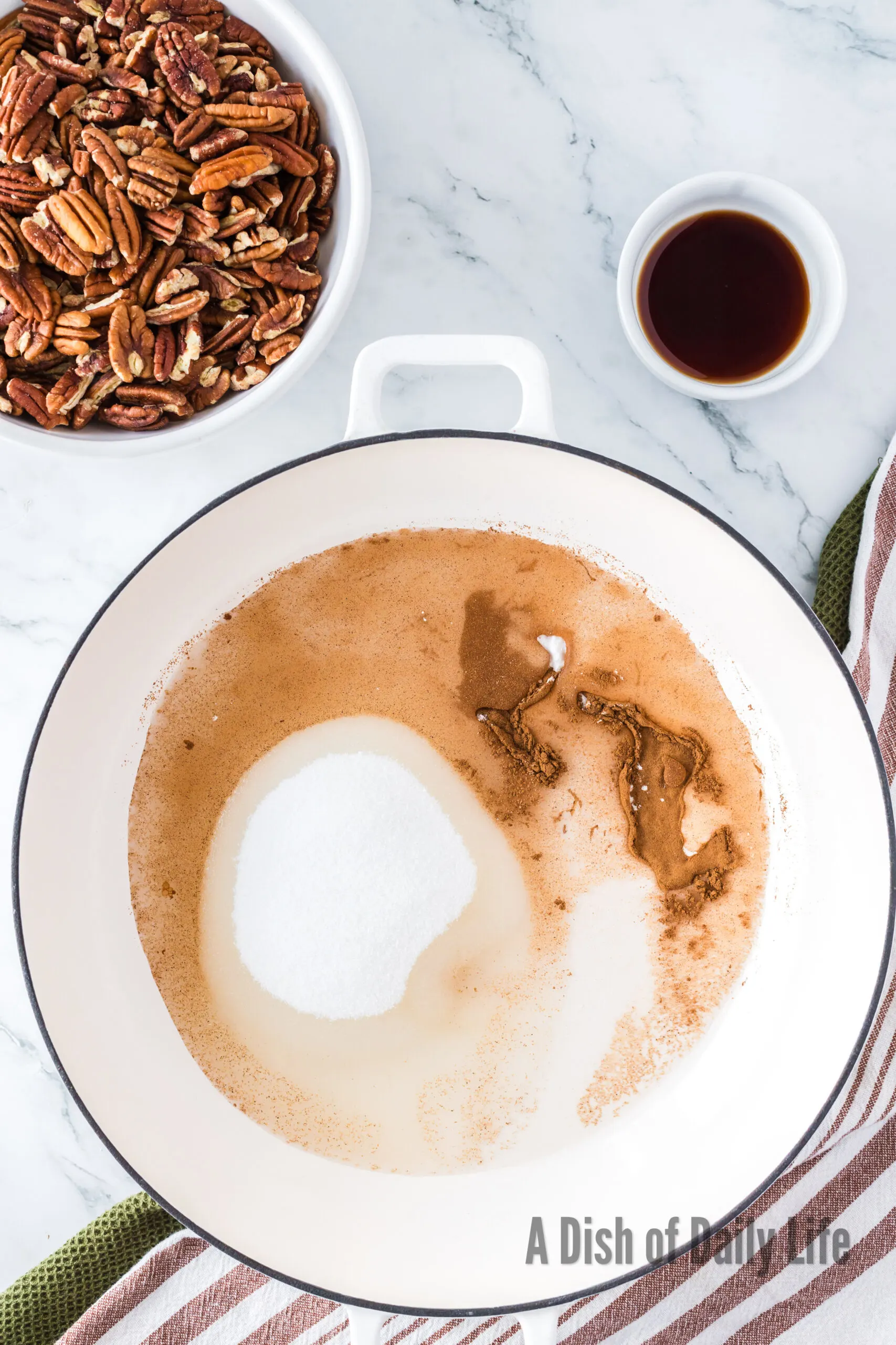 sugar, cinnamon, cream of tartar and boiling water in a skillet