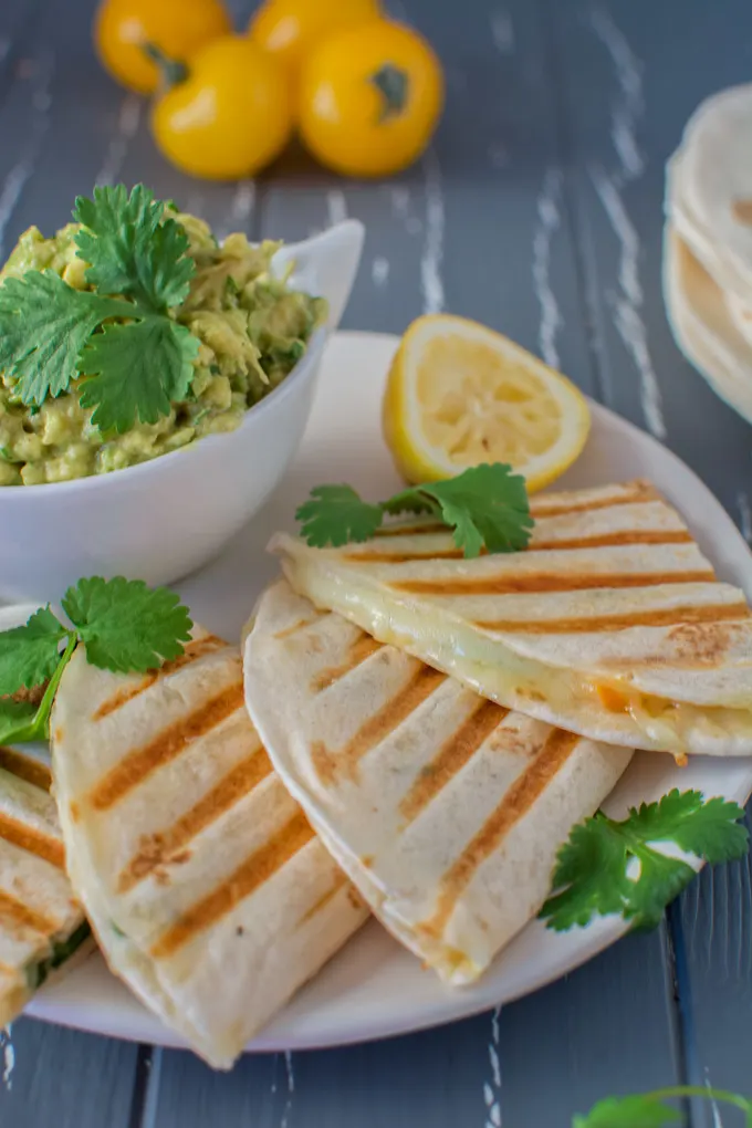 This 15-minute, healthy vegetarian Mediterranean Quesadilla filled with mushrooms, olives and bell peppers can serve as a quick lunch or a light dinner. Serve it with guacamole or a fresh salad. Great recipe for game day too!