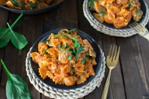 Mini Italian sausage meatballs cooked with Bow Tie pasta in a creamy tomato sauce. Ready in 30 minutes!