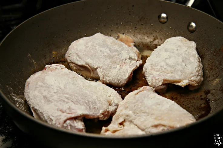 Chicken thighs dredged in flour