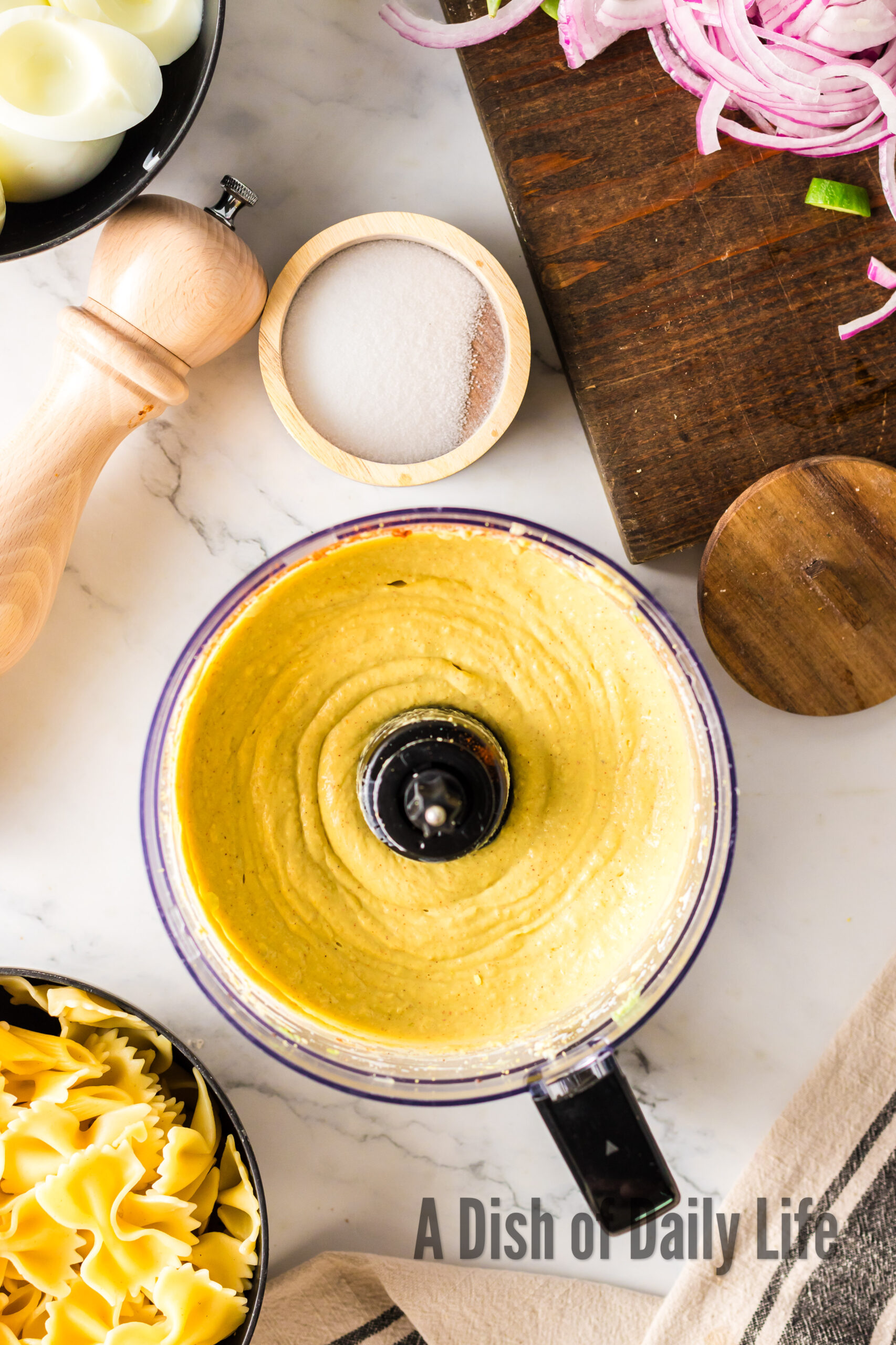 creamy dressing mixed in food processor.