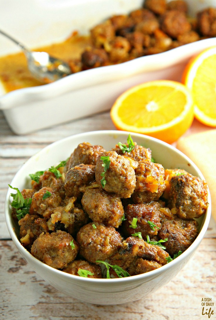 Slow Cooker Pork Meatballs with Orange Sauce...tender, juicy meatballs, packed with vegetables, covered with an orange glaze that everyone goes crazy for! Great as a party appetizer recipe, or delicious easy dinner with rice! Leftovers freeze well. 