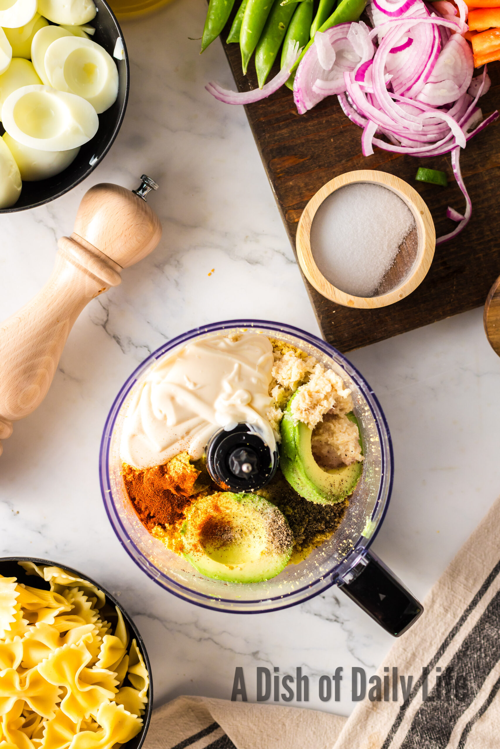 All other dressing ingredients added to food processor, unmixed.