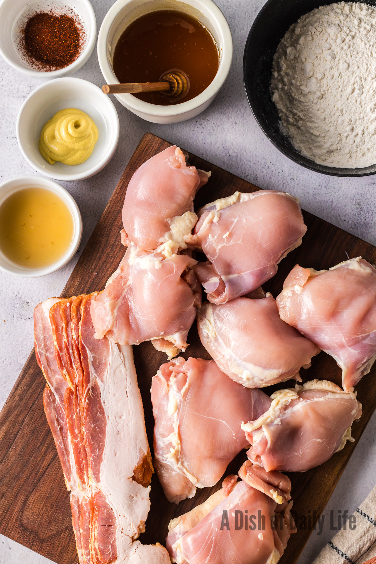 All ingredients laid out on counter for honey mustard chicken thighs