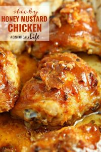 Sticky Honey Mustard Chicken...chicken thighs drizzled with a sweet and tangy honey mustard sauce, and flavored with bacon and chili powder, are sure to be a new family favorite! #chicken #honey #easydinner #weeknightdinner