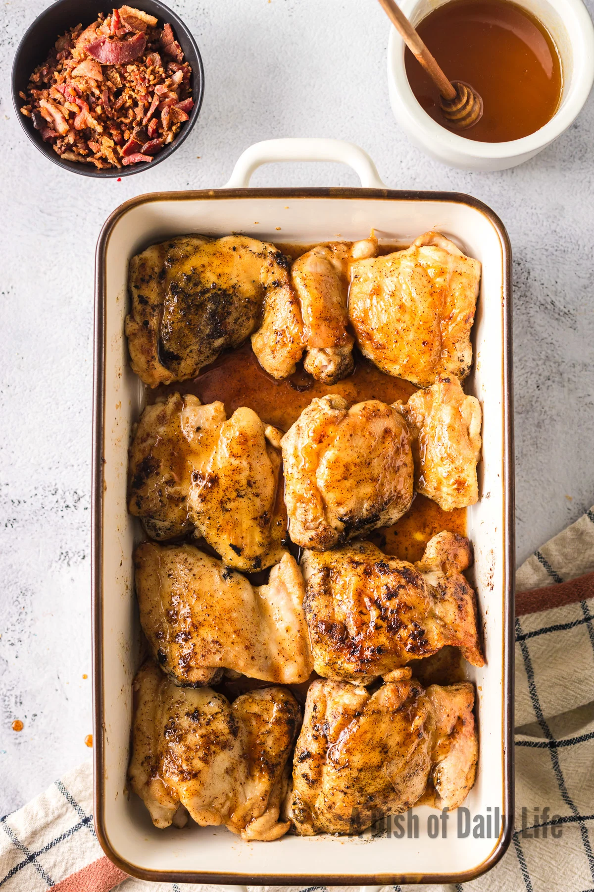 honey sauce poured over the chicken thighs